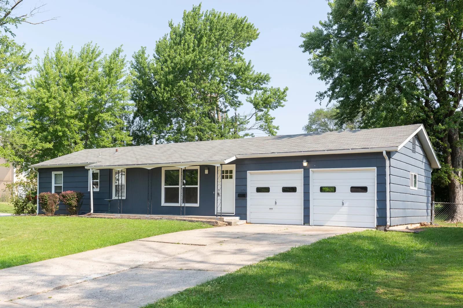 Brick ranch exterior with a covered entry, Kansas City metro listing